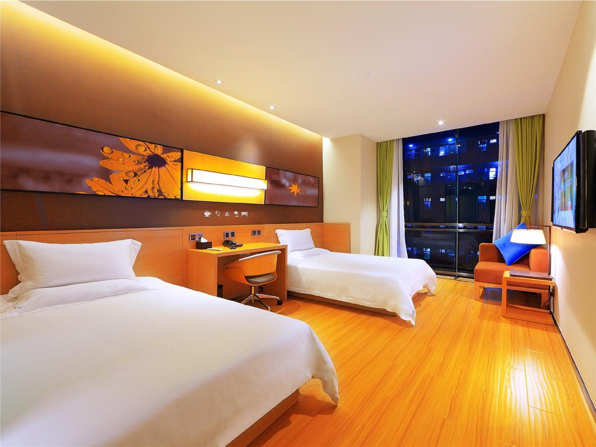 Iu Hotel Shenyang Railway Station Sk Transfer Center Extérieur photo