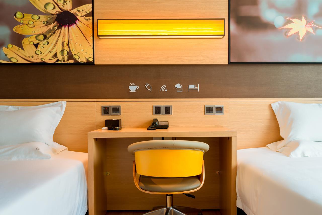 Iu Hotel Shenyang Railway Station Sk Transfer Center Extérieur photo